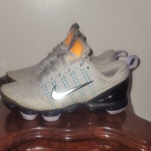 Nike Gray and Orange Sneakers with Black Accents